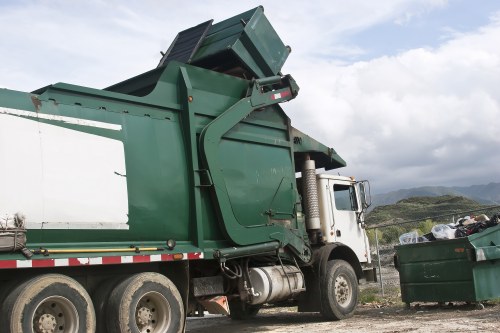Workers sorting construction waste for recycling